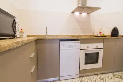 Una cocina o zona de cocina en Can Pauet Apartaments