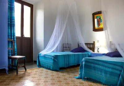 Cama o camas de una habitación en Casa Carina