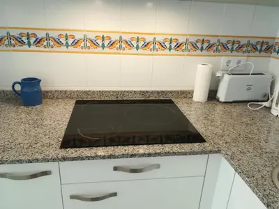 Una cocina o zona de cocina en Apartamentos Marblau
