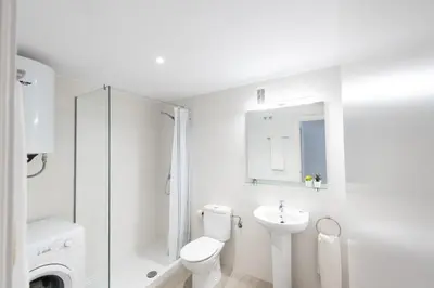 Un baño de Apartamentos Marblau