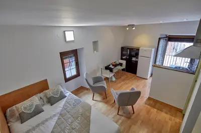 Cama o camas de una habitación en Sant Josep Loft