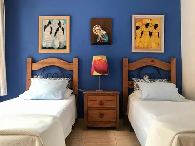 Cama o camas de una habitación en La Habana Apart Hotel