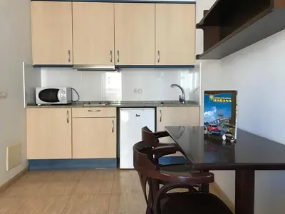 Una cocina o zona de cocina en La Habana Apart Hotel