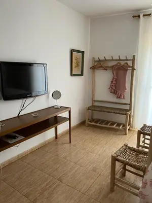 Una televisión o centro de entretenimiento en La Habana Apart Hotel