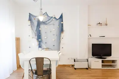 Una televisión o centro de entretenimiento en Casa Cris Palamos