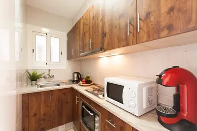 Una cocina o zona de cocina en Lets Holidays APARTMENT with TERRACE NEAR BEACH