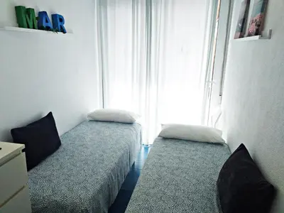 Cama o camas de una habitación en APARTAMENTO con TERRAZA VISTAS AL MAR