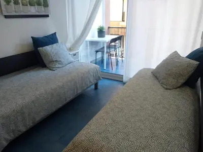 Cama o camas de una habitación en APARTAMENTO con TERRAZA VISTAS AL MAR