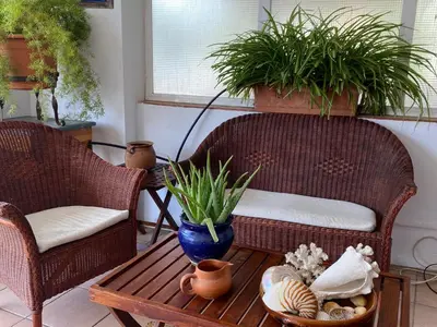 Zona de estar de La mejor terraza de Tamariu