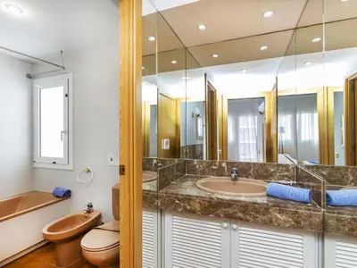 Un baño de Apartment Punta Garbí by Interhome