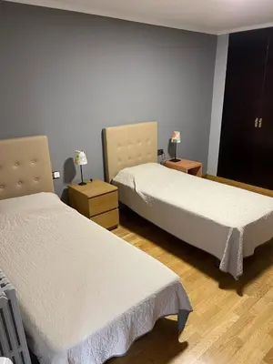 Cama o camas de una habitación en 1ra Linea Platja de Sant Feliu