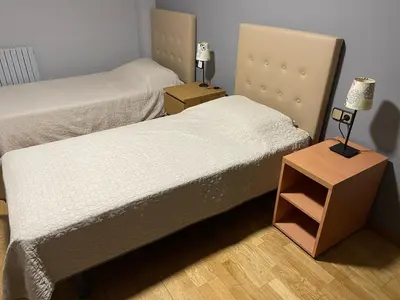 Cama o camas de una habitación en 1ra Linea Platja de Sant Feliu