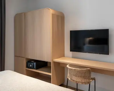 Una televisión o centro de entretenimiento en Alta House Begur