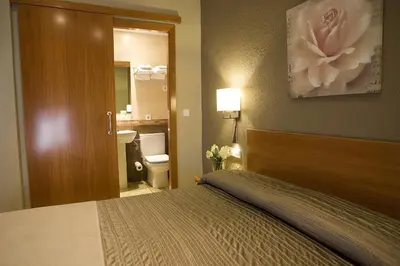 Cama o camas de una habitación en Hostal Barris