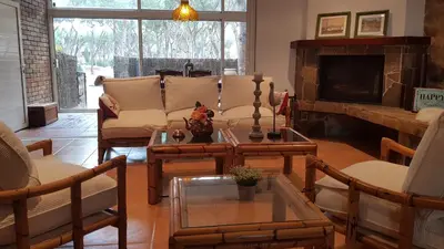 Zona de estar de VILLAS COSETTE - Villa Triana