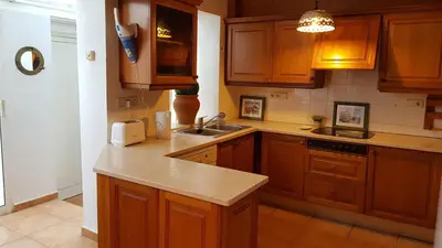 Una cocina o zona de cocina en VILLAS COSETTE - Villa Triana