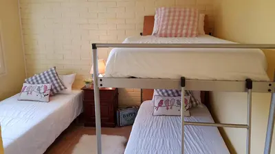 Cama o camas de una habitación en VILLAS COSETTE - Villa Triana
