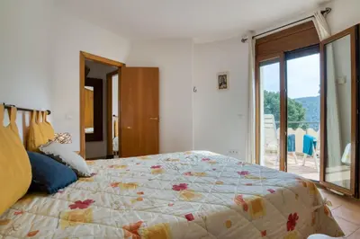 Cama o camas de una habitación en BEGUR-SA RIERA 156