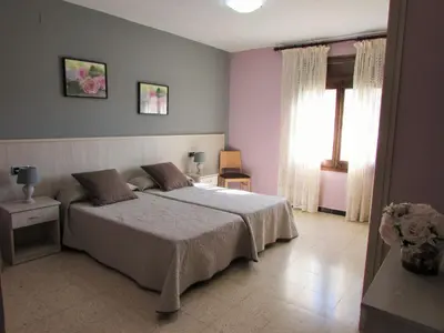 Cama o camas de una habitación en Hostal Can Bassalis
