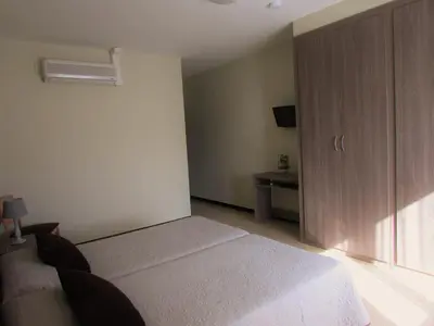 Cama o camas de una habitación en Hostal Can Bassalis