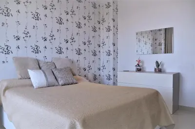 Cama o camas de una habitación en VILLA SOFIA CALELLA