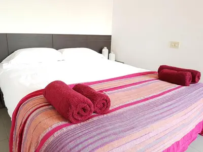 Cama o camas de una habitación en Loft Plaça Sant Josep