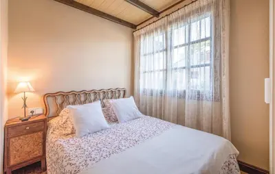 Cama o camas de una habitación en Lovely Home In Vidreres With Wifi