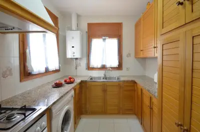 Una cocina o zona de cocina en PINEDA DALT - 313