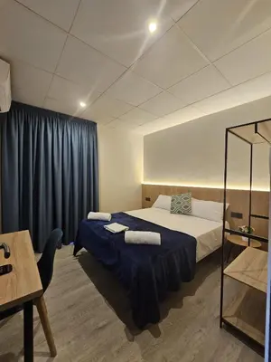 Cama o camas de una habitación en Hotel Mar i Sol