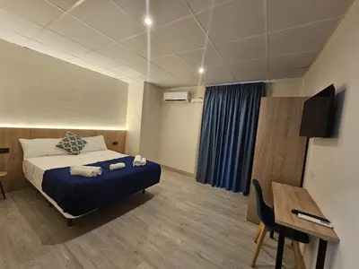 Cama o camas de una habitación en Hotel Mar i Sol