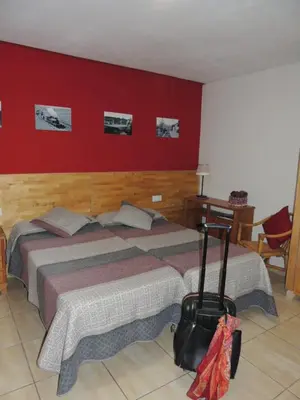 Cama o camas de una habitación en Hostal Can Massot