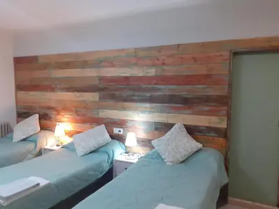 Cama o camas de una habitación en Hostal Can Massot