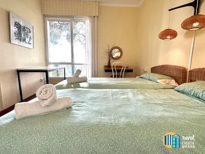 Cama o camas de una habitación en Casa Vista Mar en Platja d'Aro