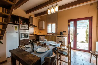 Una cocina o zona de cocina en Apartamentos Rurales Els Masos d'en Coll