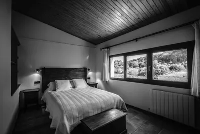 Cama o camas de una habitación en Apartamentos Rurales Els Masos d'en Coll