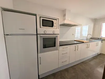 Una cocina o zona de cocina en Apartament Marina
