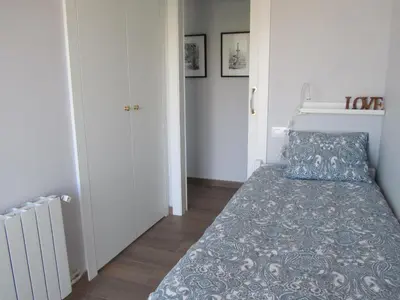 Cama o camas de una habitación en Apartamento Primera linea de mar 5 plazas