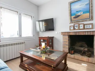 Una televisión o centro de entretenimiento en Holiday Home Mas Companys by Interhome