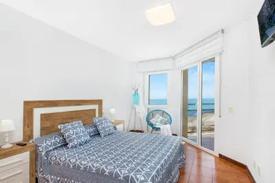 Cama o camas de una habitación en Santa Susanna Skyline Apartment