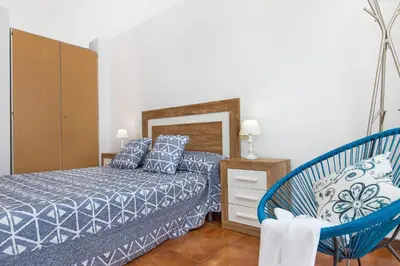 Cama o camas de una habitación en Santa Susanna Skyline Apartment