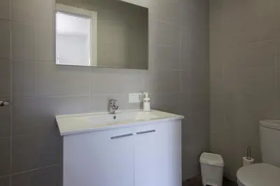 Un baño de Home Family