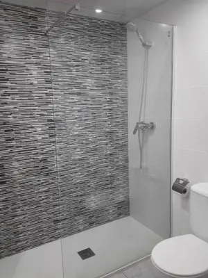 Un baño de Aparthotel Las Mariposas