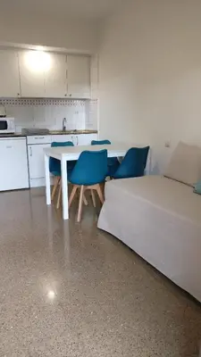 Una cocina o zona de cocina en Aparthotel Las Mariposas