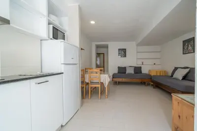 Una cocina o zona de cocina en Apartamentos Costamar