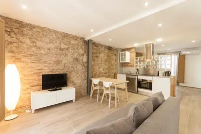 Una cocina o zona de cocina en Lets Holidays NICE LOFT IN THE CENTER OF TOSSA