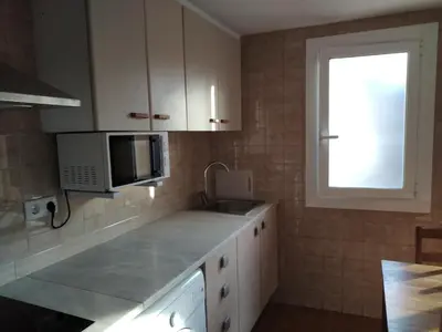 Una cocina o zona de cocina en Apartament LUISA