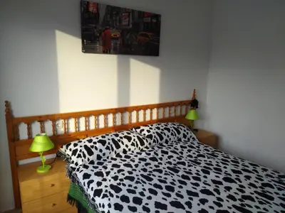 Cama o camas de una habitación en Apartament LUISA