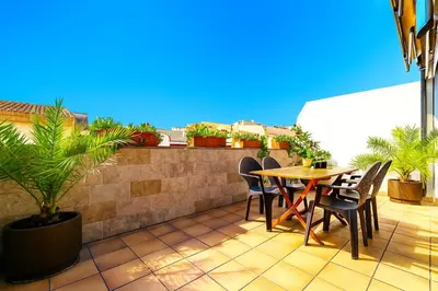 Un balcón o terraza de Casa 4Estacions Palamós 3a linia mar Port Marina-Camí de Ronda-pàrquing