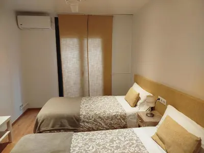 Cama o camas de una habitación en Casa 4Estacions Palamós 3a linia mar Port Marina-Camí de Ronda-pàrquing