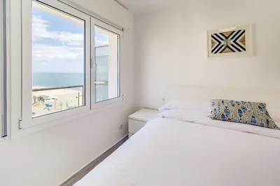 Cama o camas de una habitación en Hauzify I Apartament Rosa dels Vents
